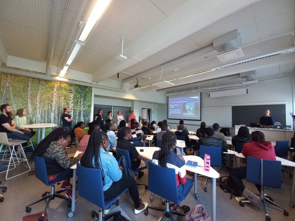 Students sitting in a classroom.
