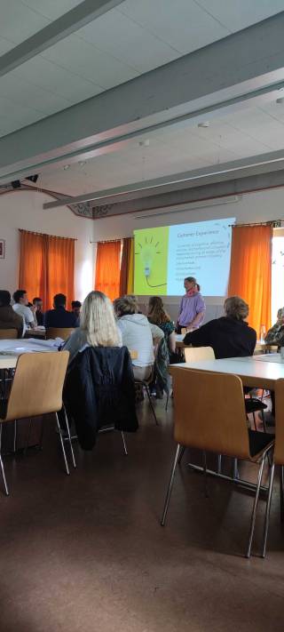 Kaisa Kokko standing on stage.