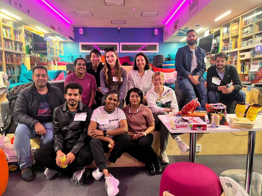 A group of students are taking picture during the informal get-together.