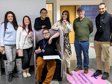 Group of people smiling.