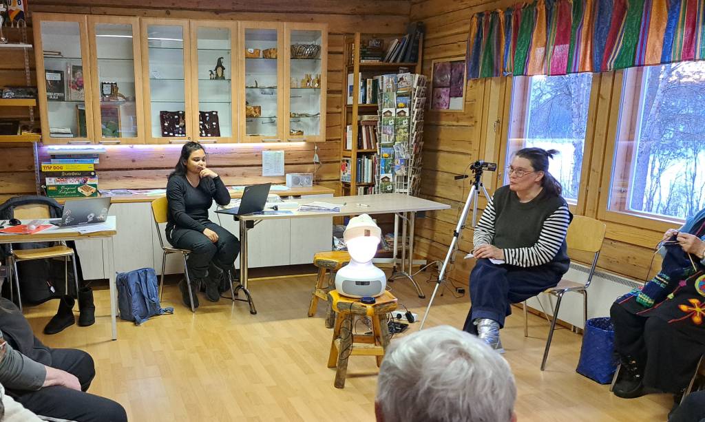 A group of people learning with Furhat robot.