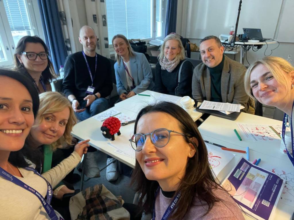 Group pf people smiling.