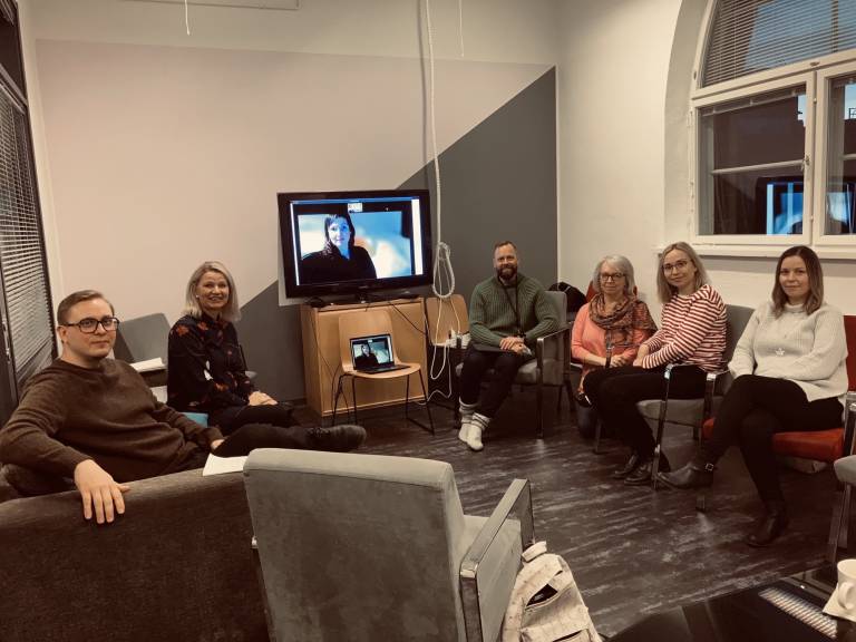 Ryhmäkuva ihmisistä.