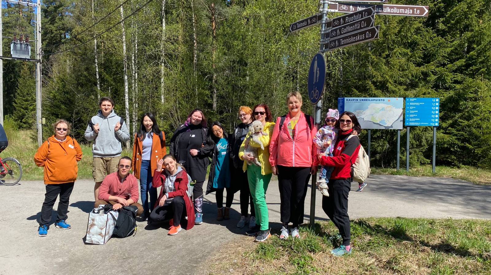 People stand by forest