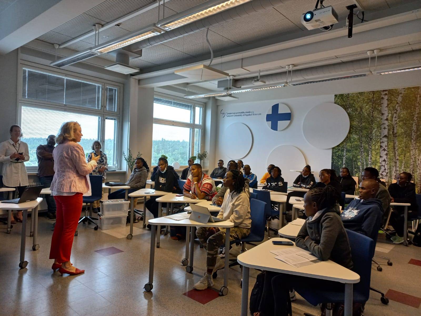 Students sitting in a class room.