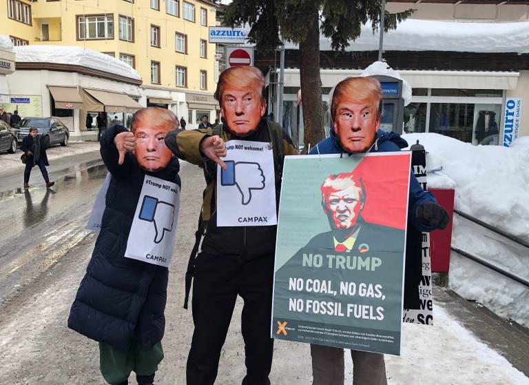 Activists protesting Donald Trump in Davos